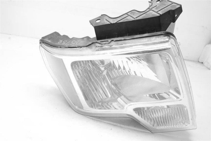 Used Right Headlight Assembly fits: 2011 Ford F150 PICKUP halogen brig