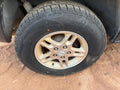 Used Wheel fits: 2000 Jeep Grand cherokee 16x7 aluminum 5 large triang