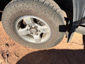 Used Wheel fits: 2004 Nissan Xterra 16x7 alloy 4 spoke flat spoke silv