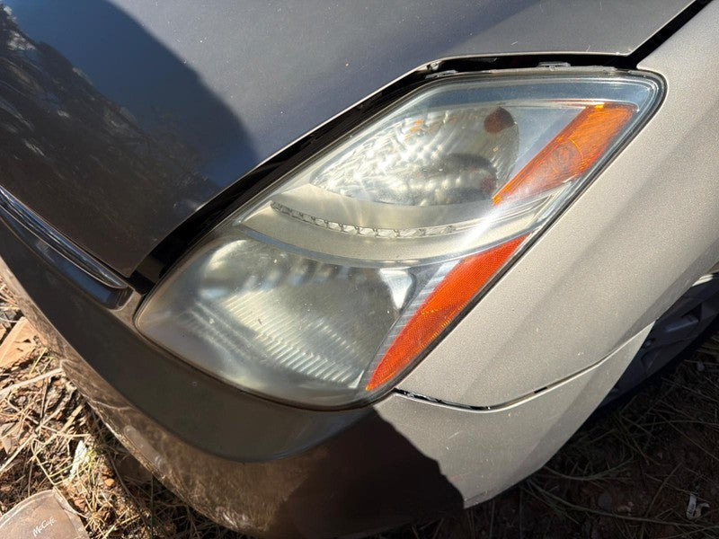 Used Left Headlight Assembly fits: 2008 Toyota Prius w/xenon HID Left 