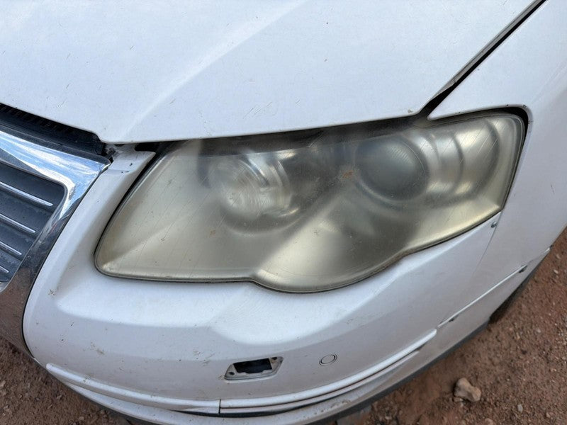 Used Left Headlight Assembly fits: 2006 Volkswagen Passat halogen Left