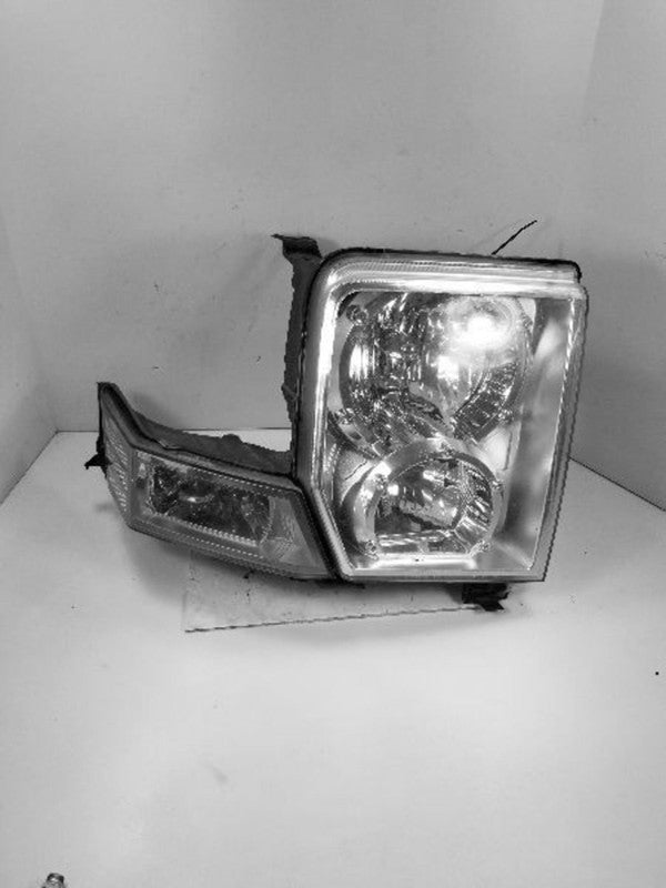 Used Right Headlight Assembly fits: 2007 Jeep Commander Right Grade A