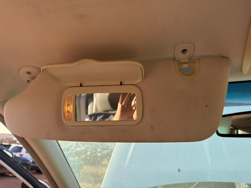 Used Left Sun Visor fits: 2008 Dodge Caravan w/illumination L. w/garag