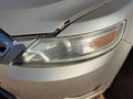 Used Left Headlight Assembly fits: 2010 Ford Taurus halogen Left Grade