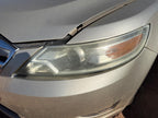 Used Left Headlight Assembly fits: 2010 Ford Taurus halogen Left Grade