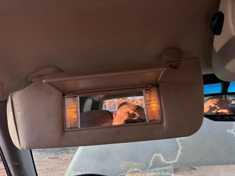 Used Left Sun Visor fits: 2005 Chevrolet Suburban 1500 illuminated Lef