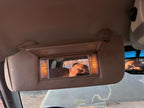 Used Left Sun Visor fits: 2005 Chevrolet Suburban 1500 illuminated Lef