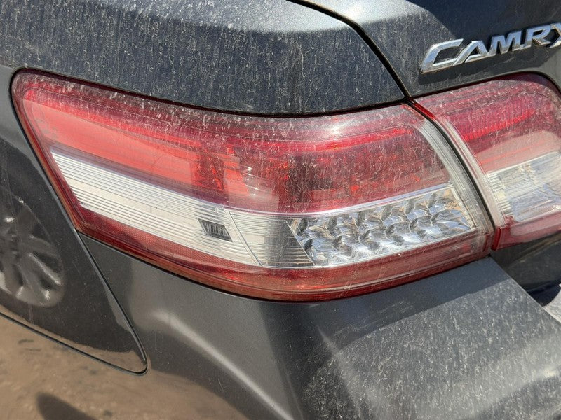 Used Left Tail Light Assembly fits: 2011 Toyota Camry quarter panel mo