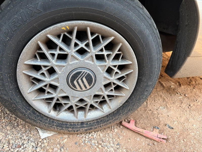 Used Wheel Cover fits: 2001 Mercury Grand marquis 20 cross spokes Grad