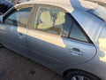 Used Rear Left Door Assembly Rear Side fits: 2002 Toyota Camry electri