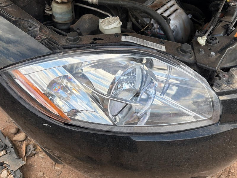 Used Right Headlight Assembly fits: 2006 Mitsubishi Eclipse Cpe Right 