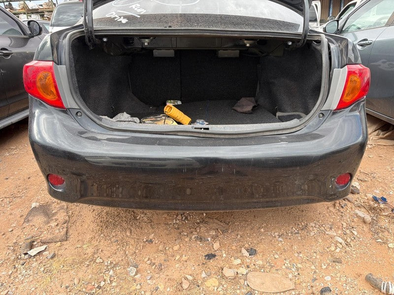 Used Rear Bumper Assembly Rear fits: 2010 Toyota Corolla w/o S model a