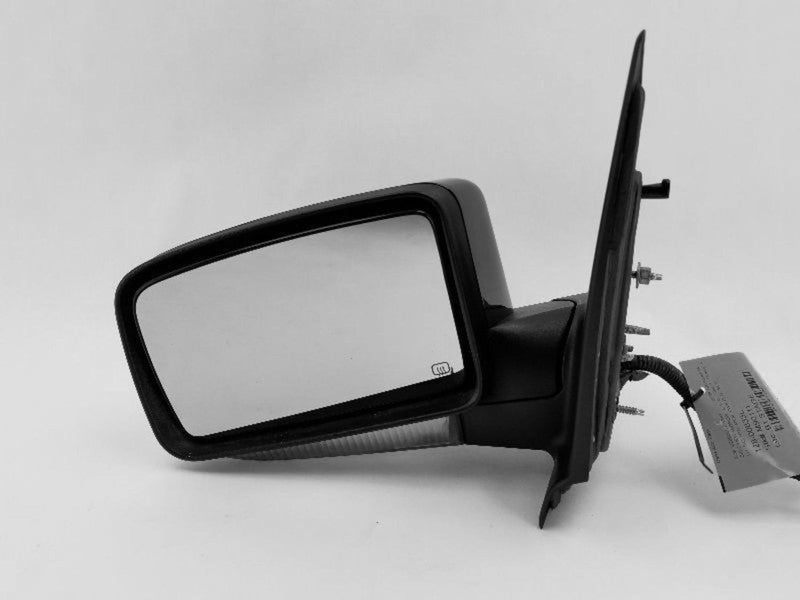Used Left Door Mirror fits: 2005 Lincoln Navigator Power approach lamp