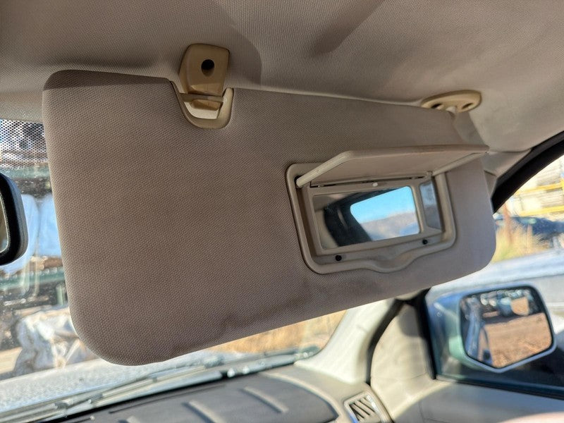 Used Right Sun Visor fits: 2010 Mercury Mariner w/illumination w/sunro