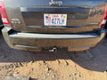 Used Rear Bumper Assembly Rear fits: 2005 Jeep Grand cherokee w/o chro