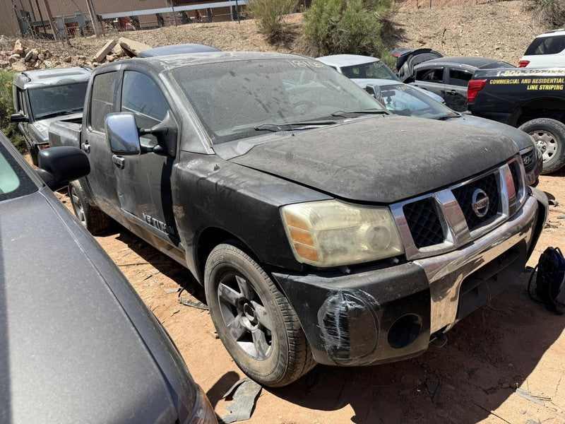 Used Front Bumper Assembly Front fits: 2005 Nissan Titan LE w/o fog la