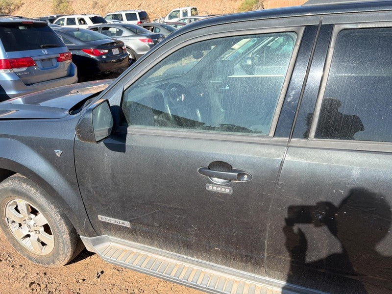 Used Front Left Door Assembly Front fits: 2008 Ford Escape electric L.