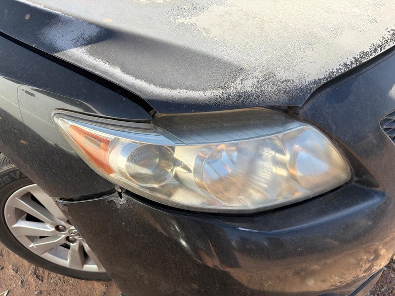 Used Right Headlight Assembly fits: 2010 Toyota Corolla R. w/o black t