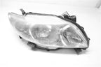Used Right Headlight Assembly fits: 2010 Toyota Corolla R. w/o black t