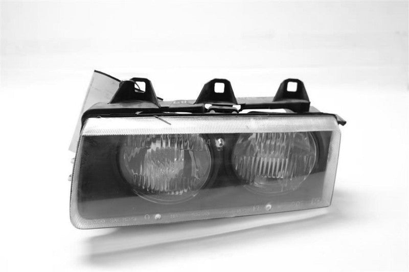 Used Left Headlight Assembly fits: 1995 Bmw 318I Left Grade A