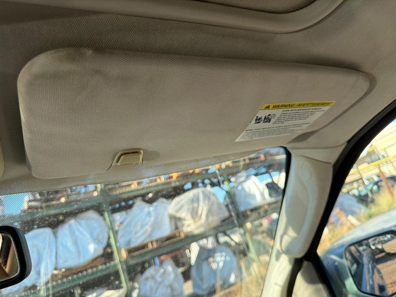Used Right Sun Visor fits: 2010 Mercury Mariner w/illumination w/sunro