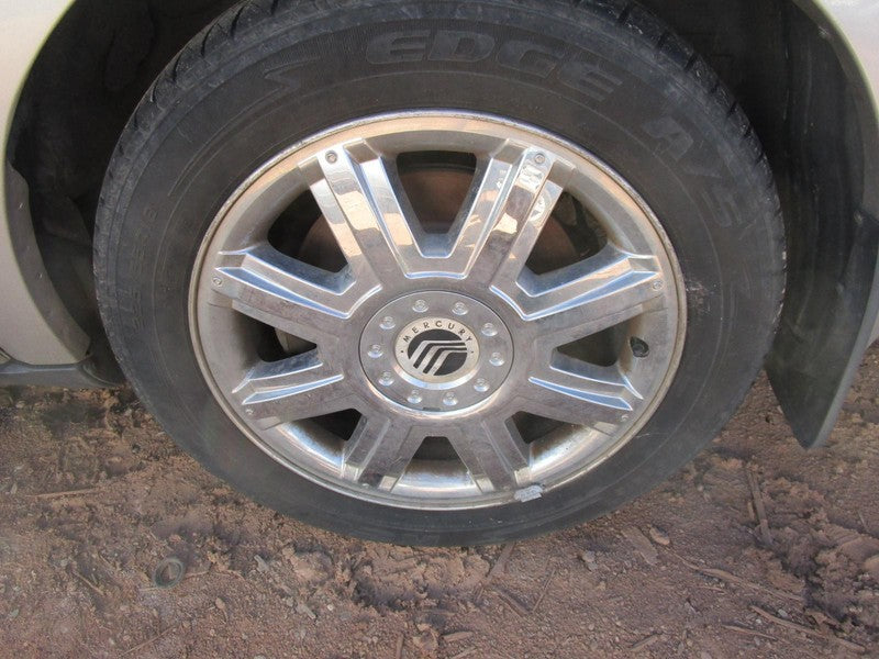 Used Wheel fits: 2007 Mercury Montego 18x7 8 spoke chrome clad Grade C