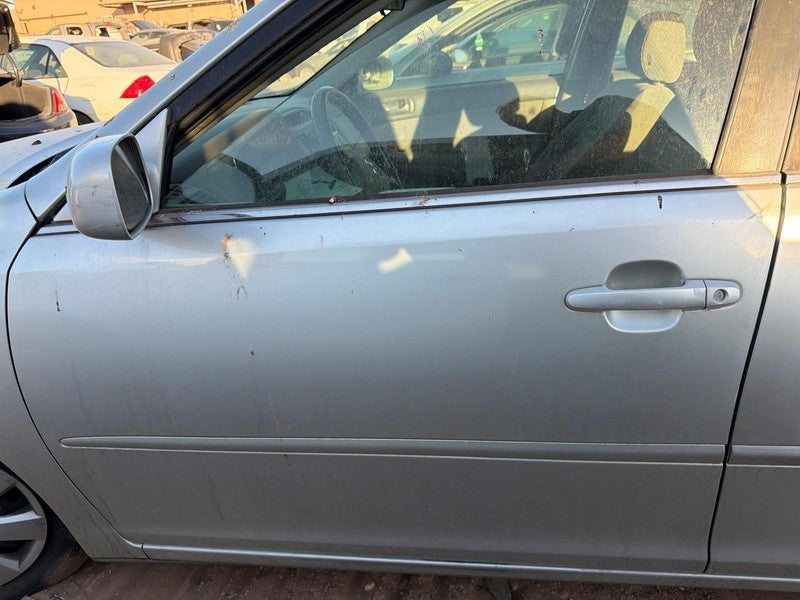 Used Front Left Door Assembly Front fits: 2002 Toyota Camry electric w