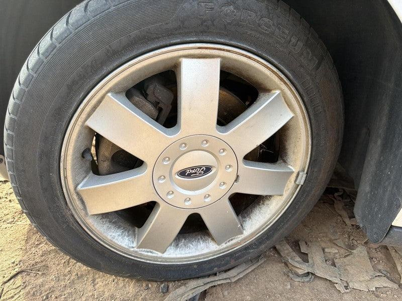 Used Wheel fits: 2006 Ford Five hundred 17x7 7 spoke aluminum w/o expo