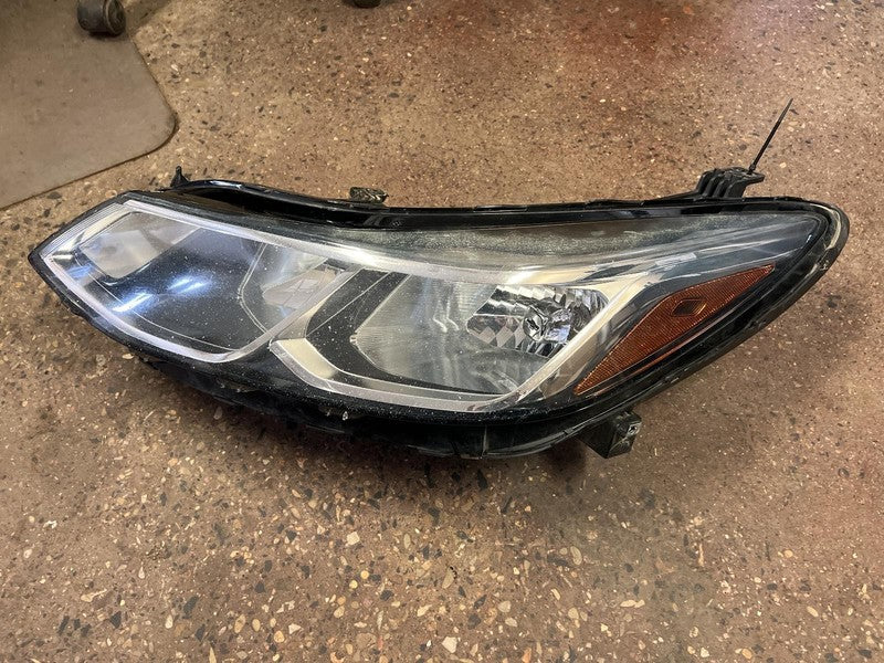 Used Left Headlight Assembly fits: 2018 Chevrolet Cruze halogen w/o LE