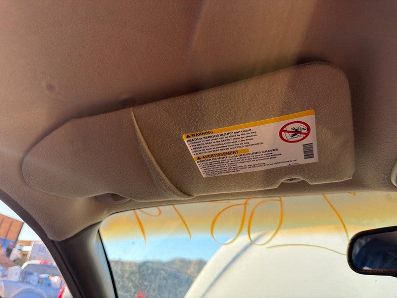 Used Left Sun Visor fits: 2005 Pontiac Bonneville w/illumination Left 