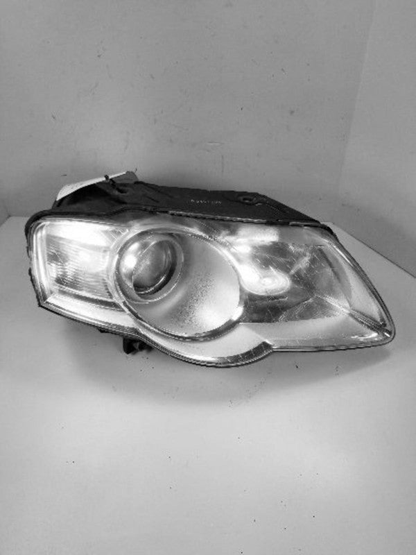 Used Left Headlight Assembly fits: 2006 Volkswagen Passat halogen Left