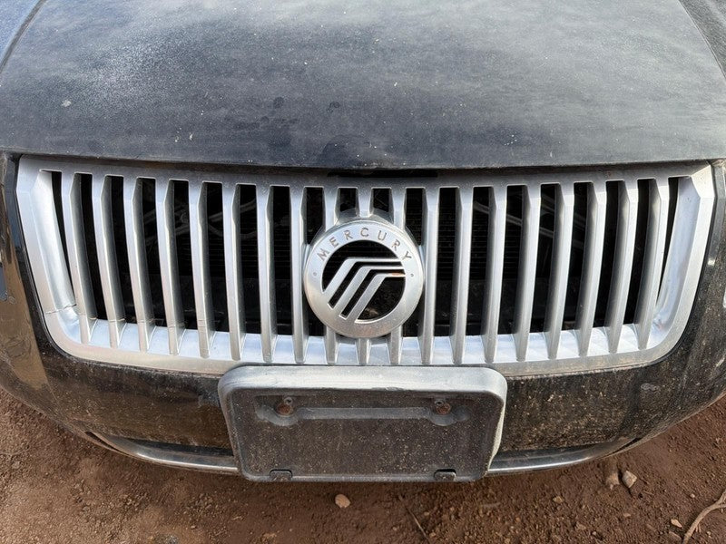 Used Upper Grille fits: 2007 Mercury Milan upper satin aluminum finish