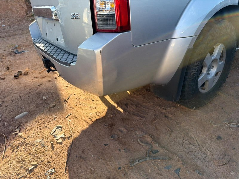 Used Rear Bumper Assembly Rear fits: 2005 Nissan Pathfinder Rear Grade
