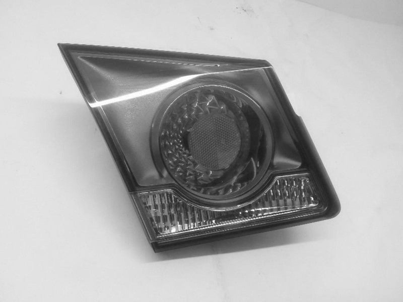 Used Left Tail Light Assembly fits: 2012 Chevrolet Cruze lid mounted L