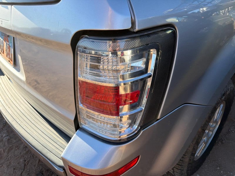 Used Right Tail Light Assembly fits: 2010 Mercury Mariner Right Grade 