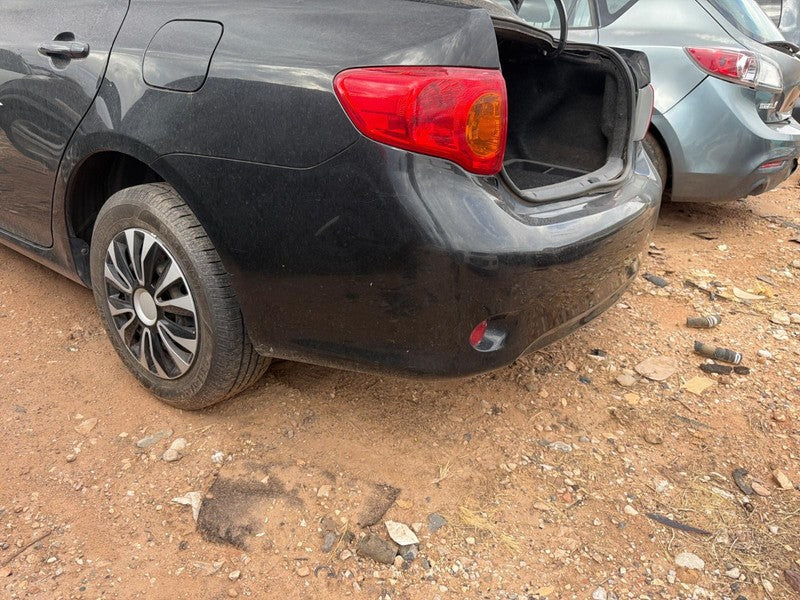 Used Rear Bumper Assembly Rear fits: 2010 Toyota Corolla w/o S model a