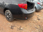 Used Rear Bumper Assembly Rear fits: 2010 Toyota Corolla w/o S model a