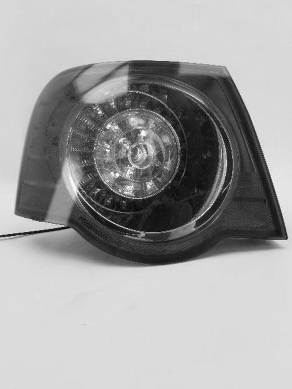Used Left Tail Light Assembly fits: 2006 Volkswagen Passat Sdn quarter