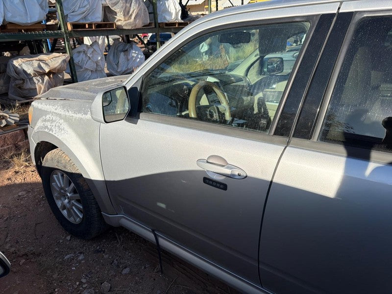 Used Front Left Door Assembly Front fits: 2010 Mercury Mariner electri