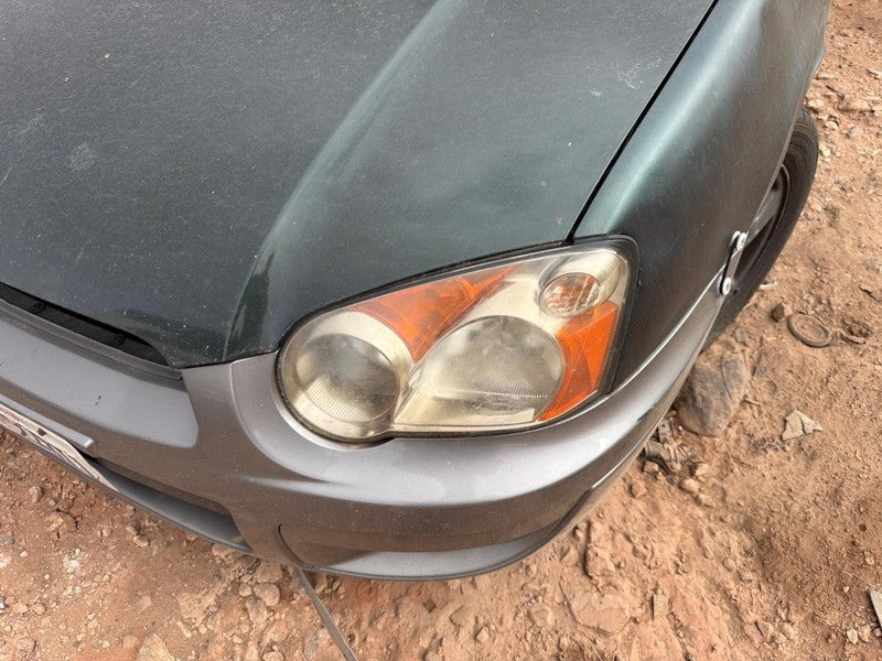 Used Left Headlight Assembly fits: 2004 Subaru Impreza w/o STi L. Left