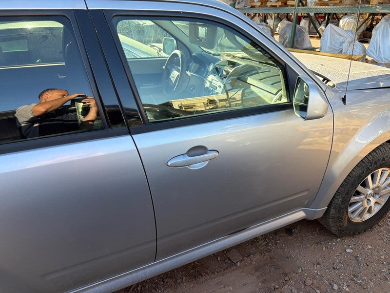 Used Front Right Door Assembly Front fits: 2010 Mercury Mariner electr
