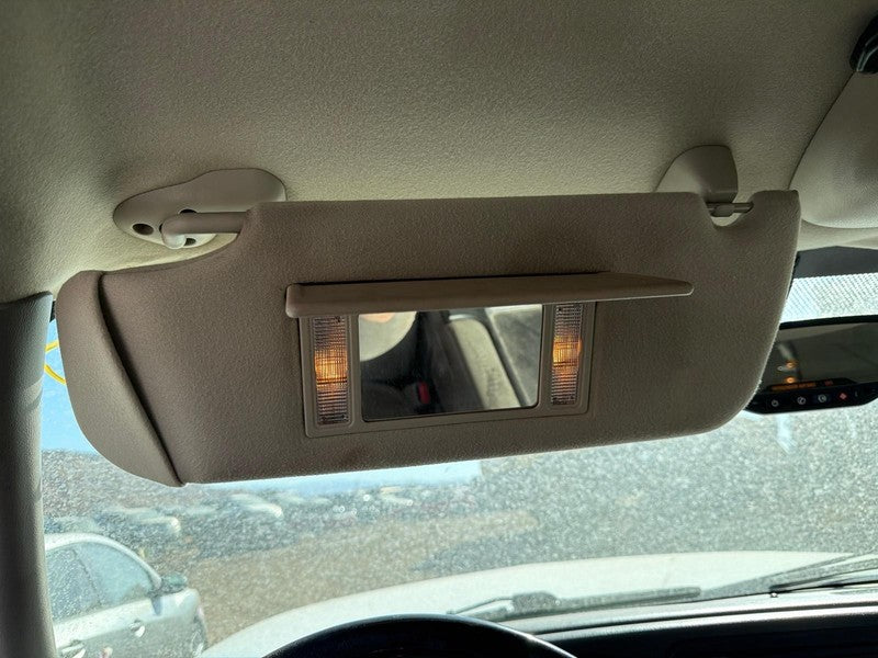 Used Left Sun Visor fits: 2006 Chevrolet Suburban 1500 illuminated Lef