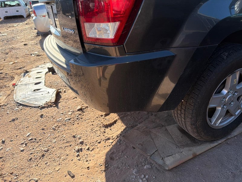 Used Rear Bumper Assembly Rear fits: 2005 Jeep Grand cherokee w/o chro