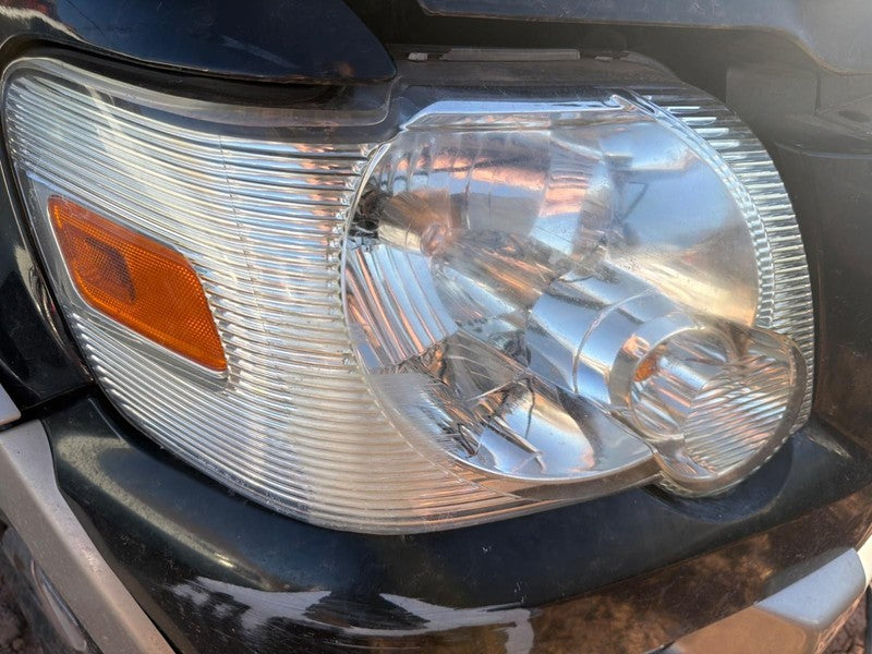 Used Right Headlight Assembly fits: 2008 Ford Explorer clear backgroun
