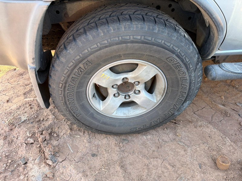 Used Wheel fits: 2004 Nissan Xterra 16x7 alloy 4 spoke flat spoke silv
