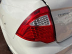 Used Left Tail Light Assembly fits: 2011 Ford Fusion Left Grade A