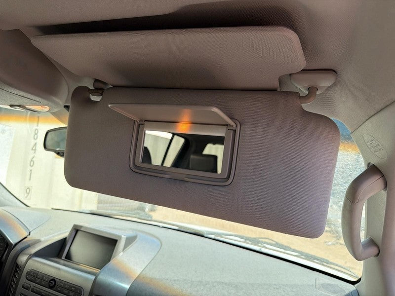 Used Right Sun Visor fits: 2005 Nissan Armada w/illumination primary l