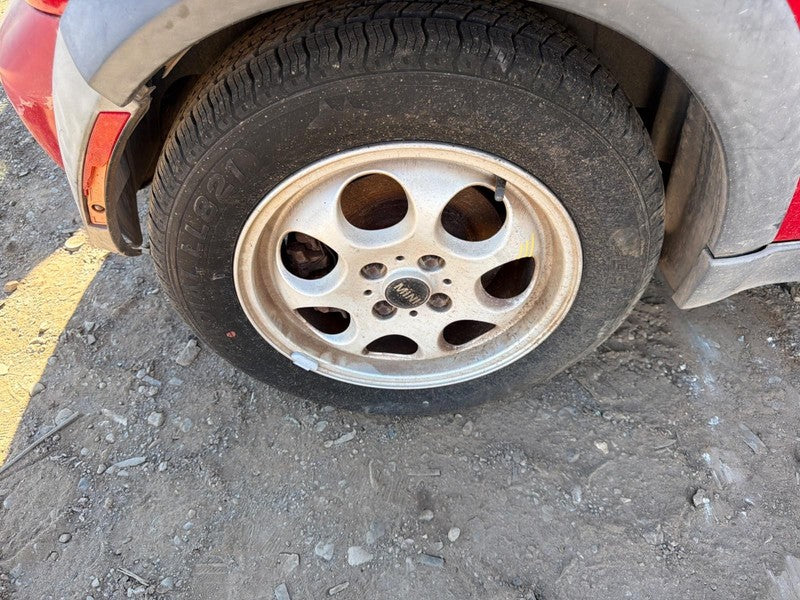 Used Wheel fits: 2005 Mini COOPER 15x5-1/2 alloy 7 hole Conv white Gra