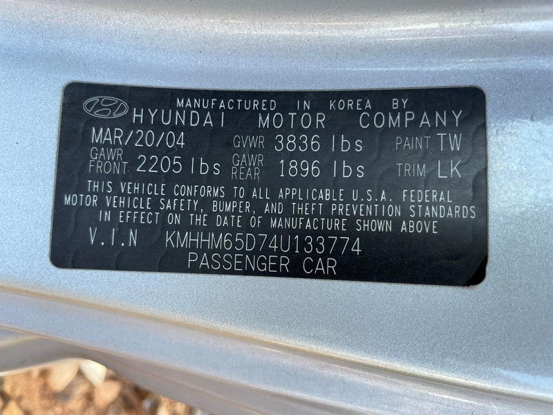 Used Left Tail Light Assembly fits: 2004 Hyundai Tiburon quarter panel