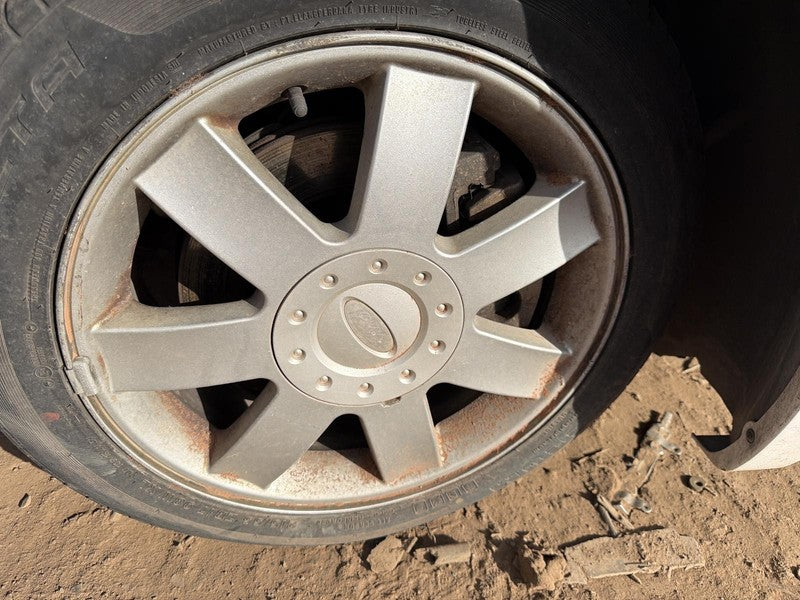 Used Wheel fits: 2006 Ford Five hundred 17x7 7 spoke aluminum w/o expo